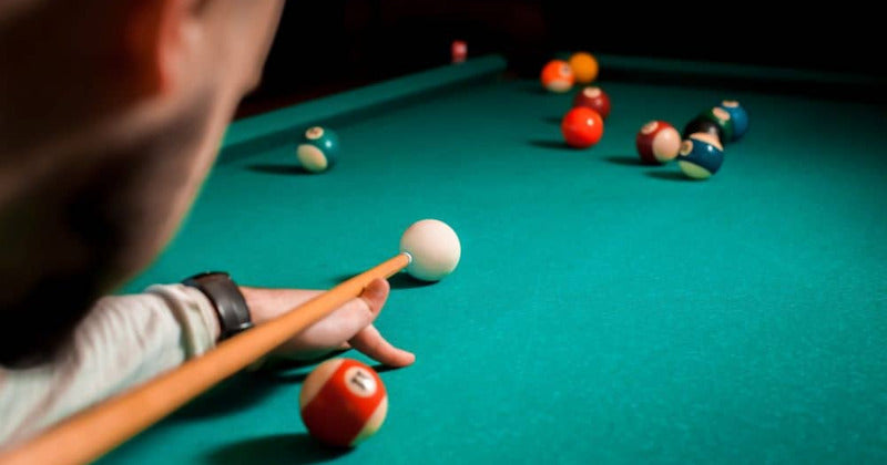 how to hold a pool stick